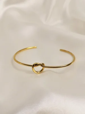 Βραχιόλι χειροπέδα κόμπος χρυσό