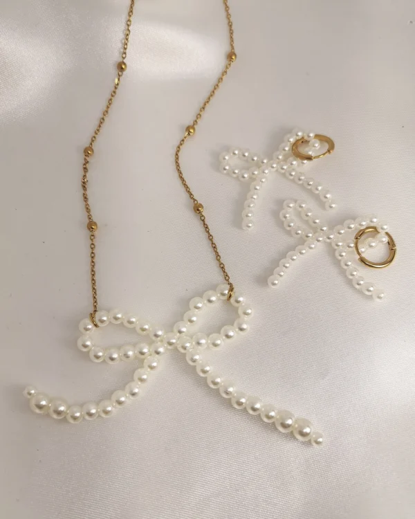 IMG_20250519_184746_result Σετ Κολιέ Σκουλαρίκια πέρλα φιόγκος χρυσό